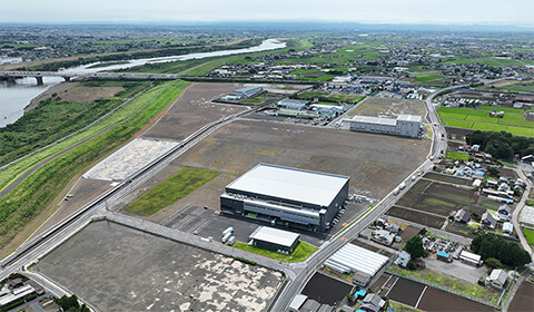 明和東部工業団地の空撮写真。広く整備された土地が拡がる。